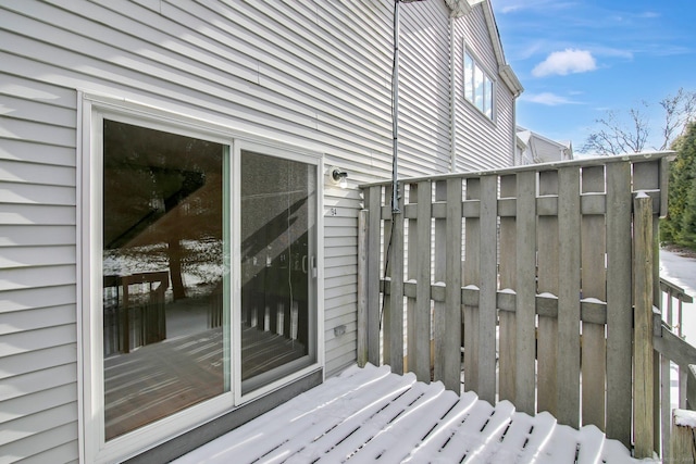 view of snow covered deck