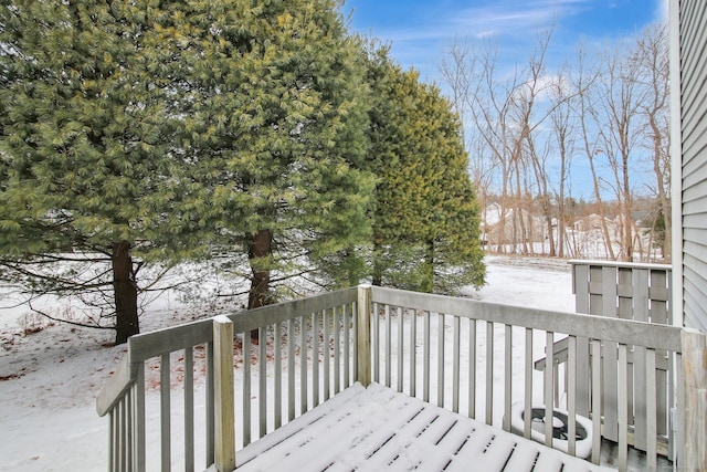 view of snow covered deck