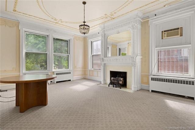 interior space featuring radiator heating unit and a wall unit AC