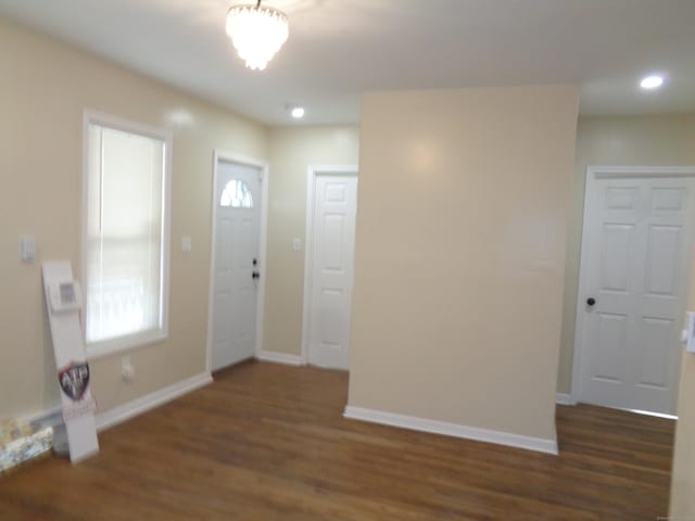 foyer entrance featuring dark hardwood / wood-style flooring