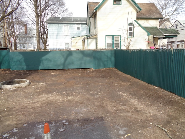 view of yard with an outdoor fire pit