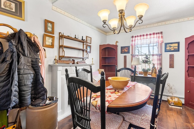 dining room with an inviting chandelier, a baseboard radiator, and dark hardwood / wood-style floors