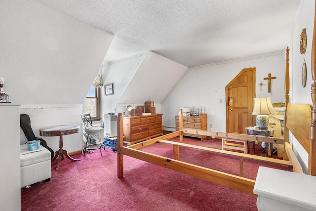 carpeted bedroom with vaulted ceiling, a baseboard radiator, and a textured ceiling