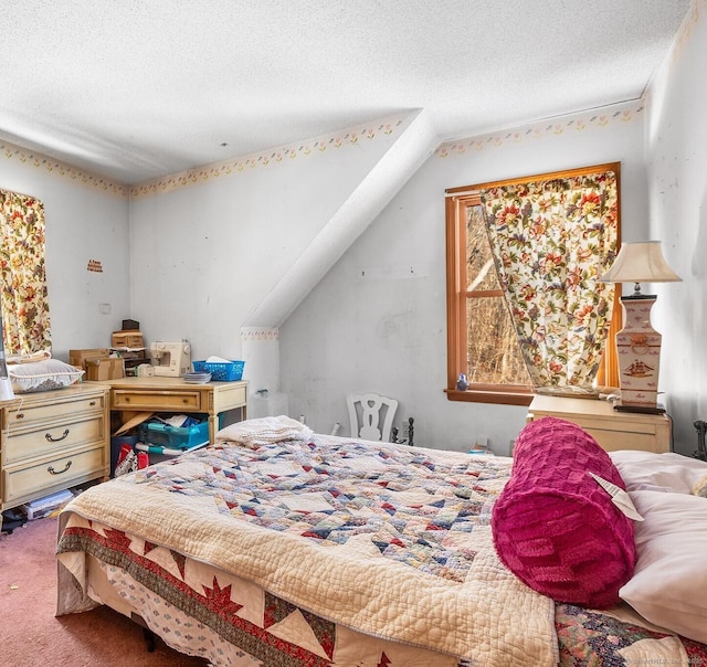 carpeted bedroom featuring vaulted ceiling and a textured ceiling