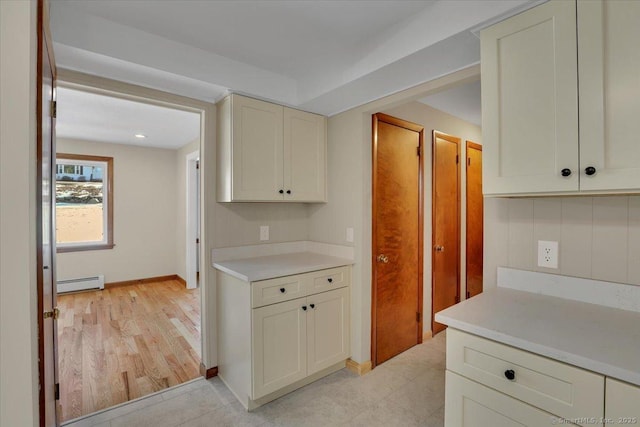 kitchen with a baseboard radiator