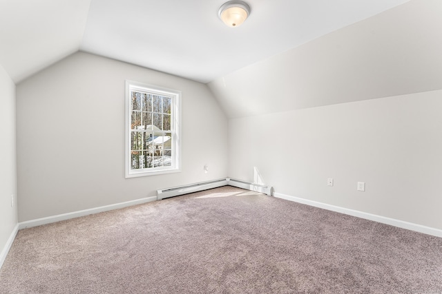 bonus room with lofted ceiling, carpet floors, and baseboards