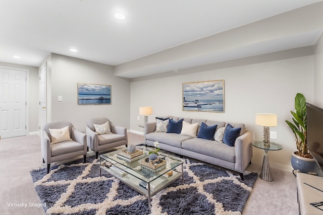 carpeted living room featuring recessed lighting and baseboards