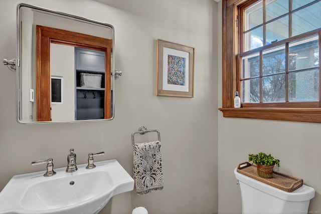 bathroom with sink and toilet