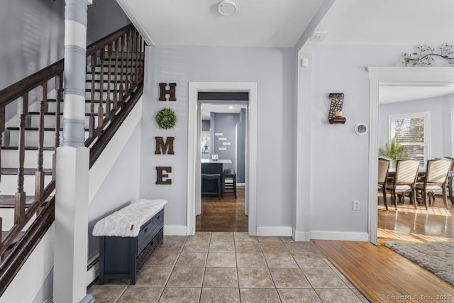 foyer featuring tile patterned flooring