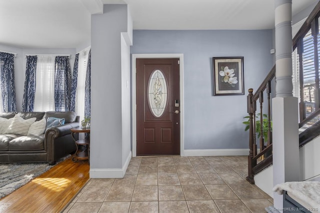 view of tiled foyer entrance