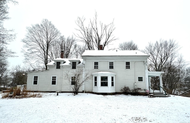 view of snow covered property