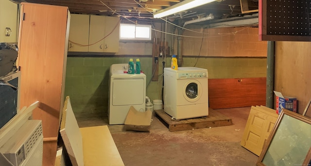 basement featuring washer and clothes dryer