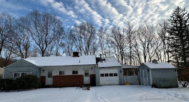 single story home with a garage