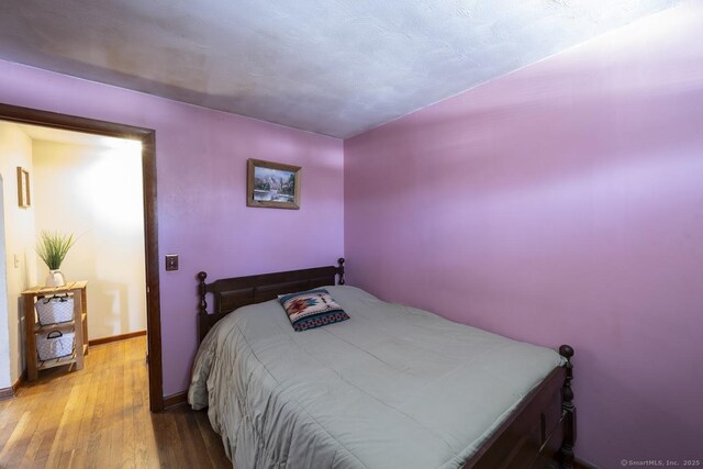 bedroom featuring light wood-type flooring