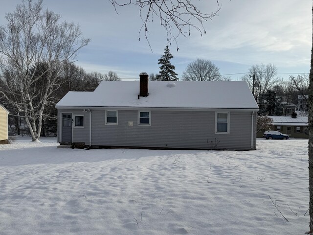 view of snow covered property