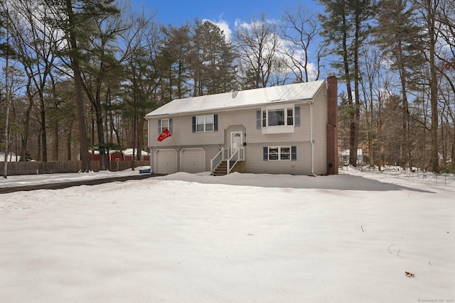 raised ranch with a garage