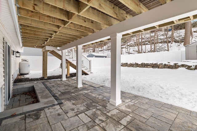 view of snow covered patio