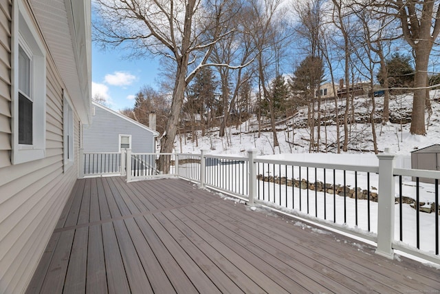 view of snow covered deck