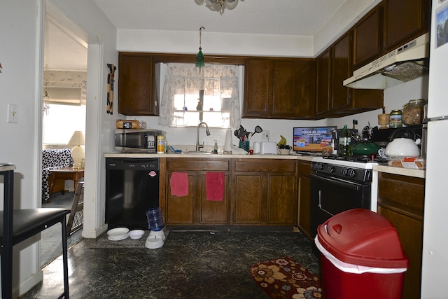 kitchen featuring dishwasher, white fridge, sink, and gas range oven