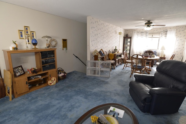 carpeted living room with ceiling fan