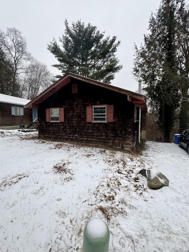 view of snow covered property