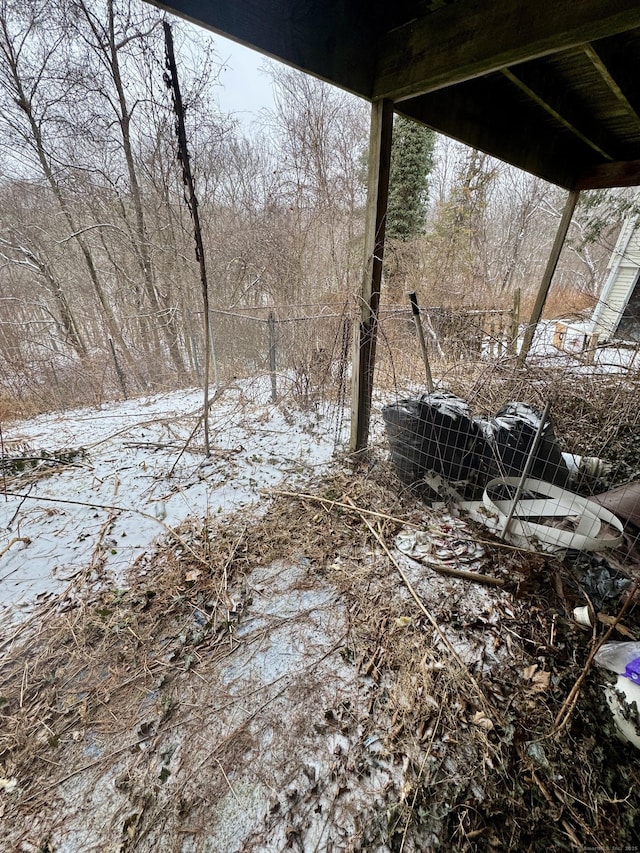 view of yard covered in snow