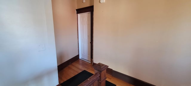 staircase with wood-type flooring