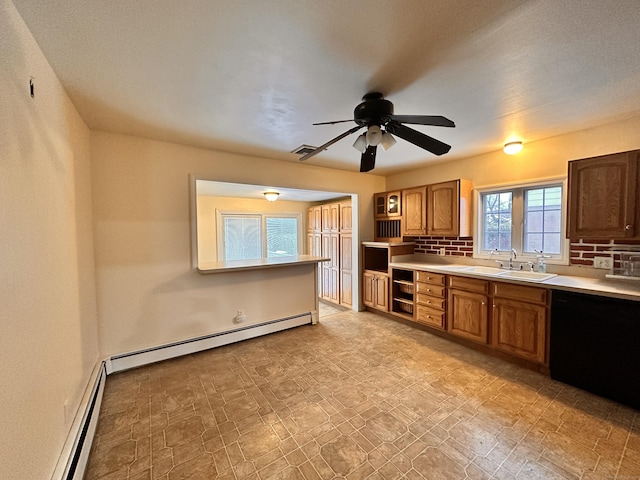 kitchen with sink, baseboard heating, dishwasher, ceiling fan, and backsplash