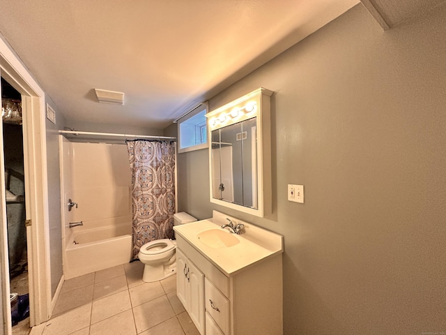 full bathroom featuring tile patterned floors, vanity, toilet, and shower / tub combo