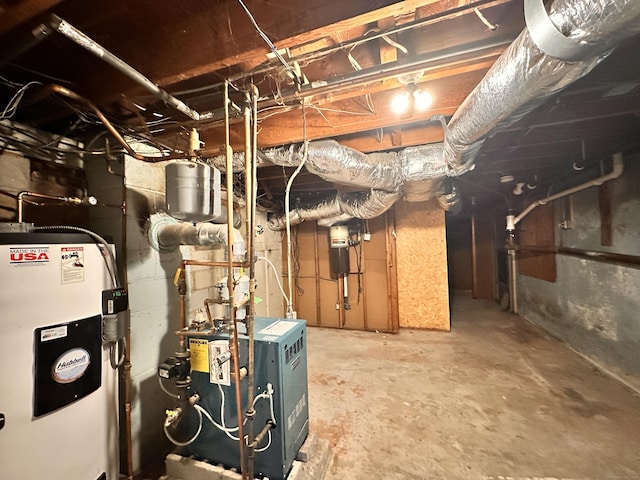 utility room with water heater