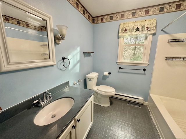 full bathroom featuring tile patterned flooring, vanity, a baseboard heating unit, toilet, and bathing tub / shower combination