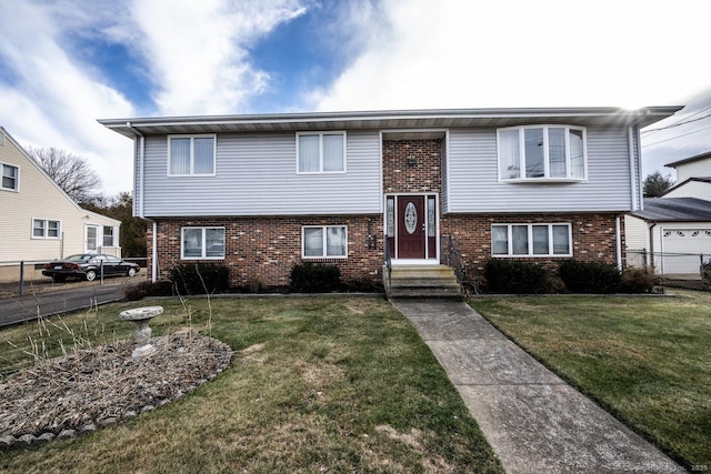 view of front of home with a front lawn