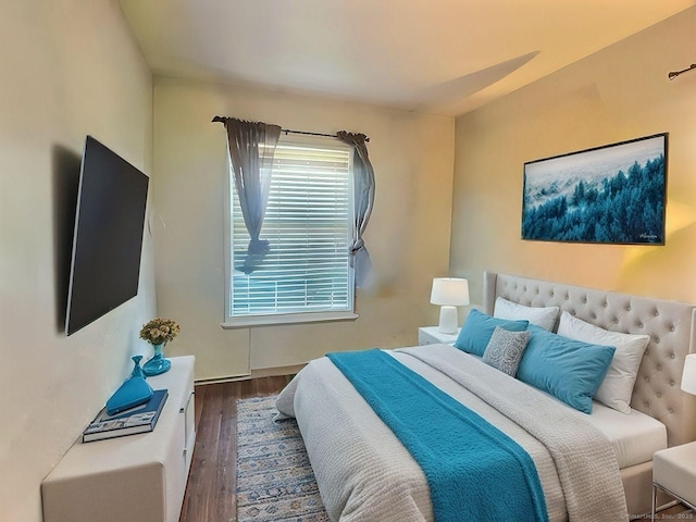 bedroom featuring dark hardwood / wood-style floors