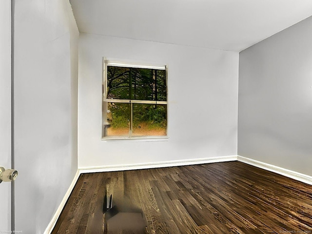 unfurnished room featuring hardwood / wood-style floors