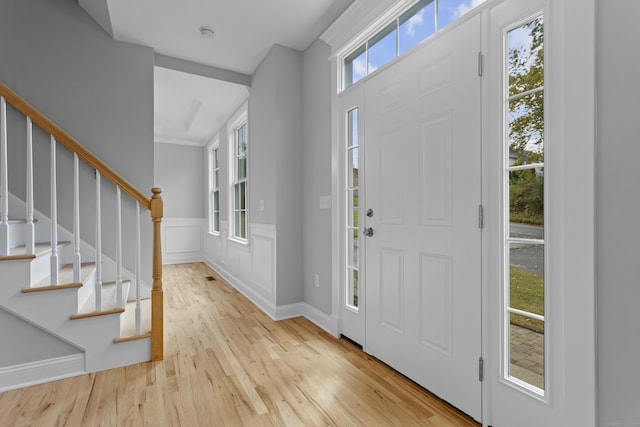 entrance foyer featuring light hardwood / wood-style floors