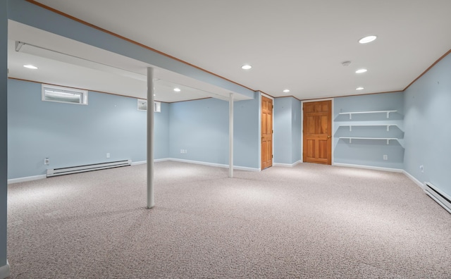 basement with baseboards, baseboard heating, carpet flooring, and recessed lighting