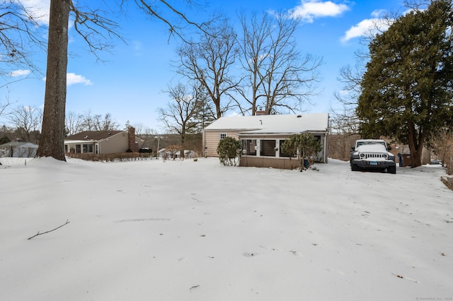 view of front of property with a chimney