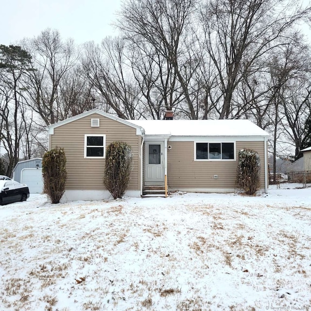 ranch-style house featuring a garage