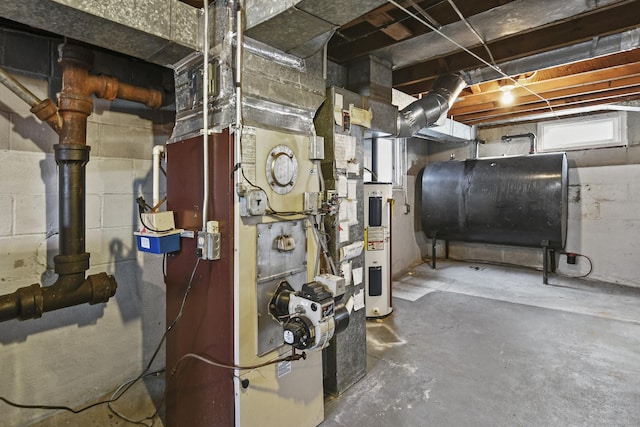 unfinished below grade area with heating unit, electric water heater, and heating fuel