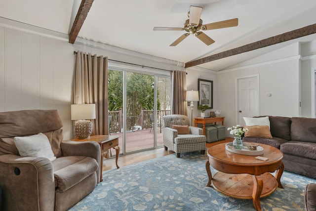 living room with hardwood / wood-style flooring, lofted ceiling with beams, and ceiling fan