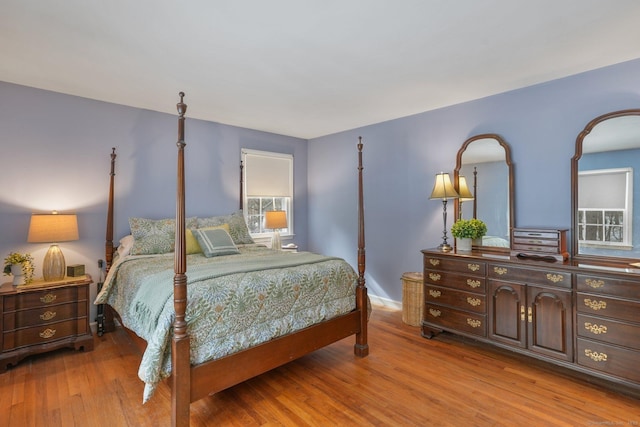 bedroom with light hardwood / wood-style floors