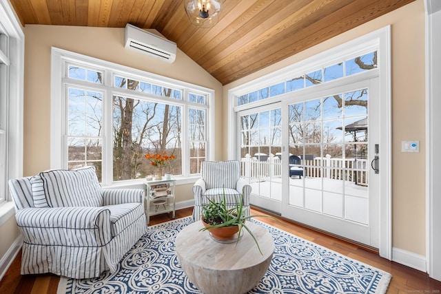 sunroom featuring wood ceiling, vaulted ceiling, and a wall mounted AC