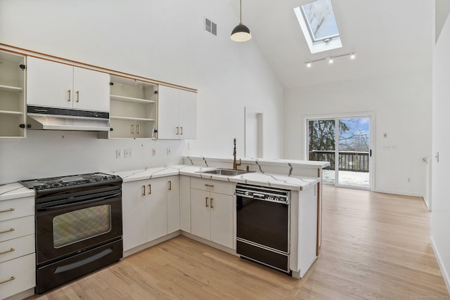 kitchen featuring visible vents, open shelves, under cabinet range hood, black appliances, and a sink