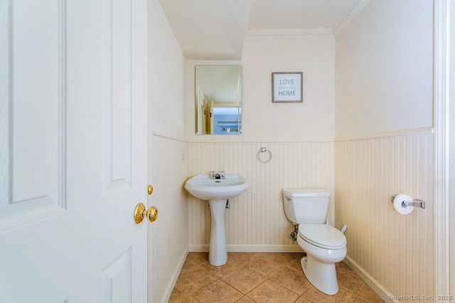 bathroom with tile patterned floors and toilet