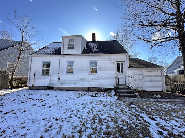 view of snow covered house