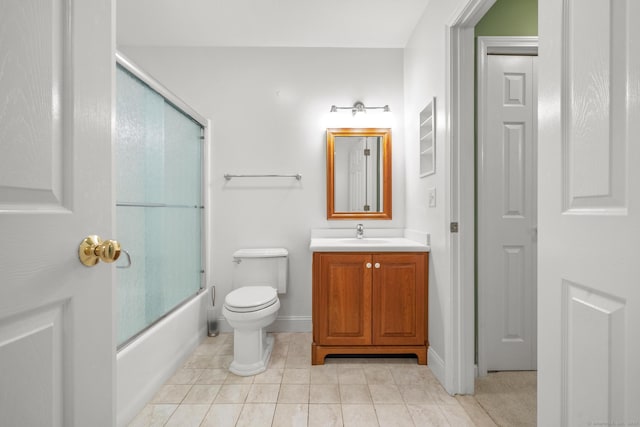 full bathroom featuring vanity, tile patterned floors, enclosed tub / shower combo, and toilet