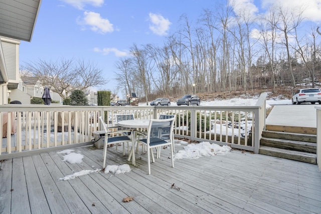 view of snow covered deck