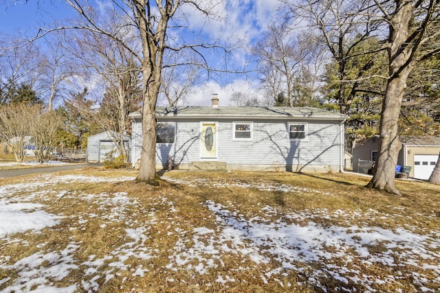 view of snow covered house