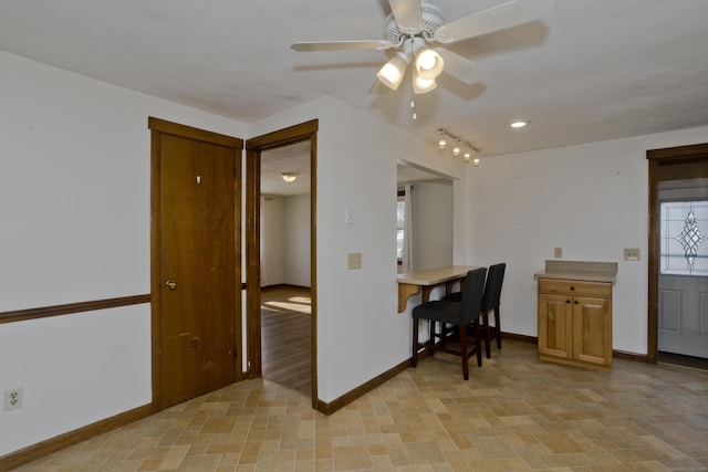 dining area with ceiling fan