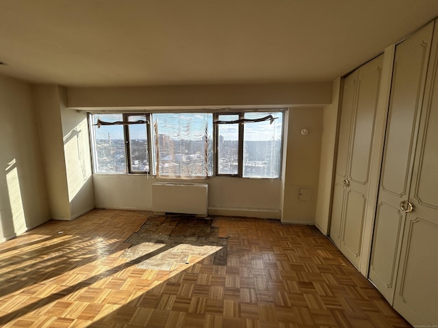 unfurnished sunroom with radiator